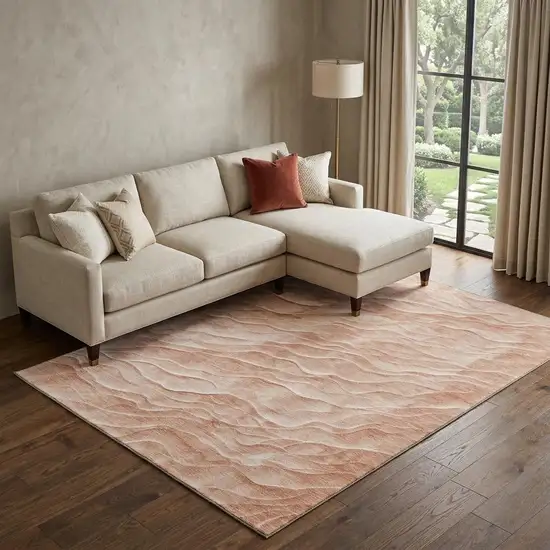 8' Coral And Ivory Abstract Washable Area Rug With UV Protection Photo 1