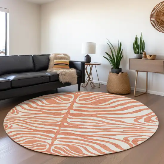 8' Coral And Ivory Animal Print Washable Round Rug With UV Protection Photo 4
