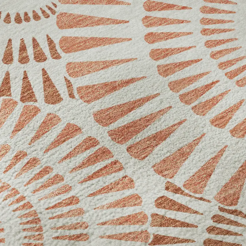 8' Coral And Ivory Geometric Washable Round Rug With UV Protection Photo 9