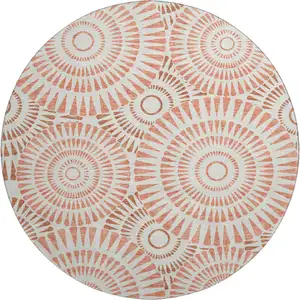 Photo of 8' Coral And Ivory Geometric Washable Round Rug With UV Protection