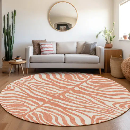 8' Coral And Ivory Round Animal Print Washable Indoor Outdoor Area Rug Photo 9