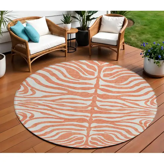 8' Coral And Ivory Round Animal Print Washable Indoor Outdoor Area Rug Photo 1