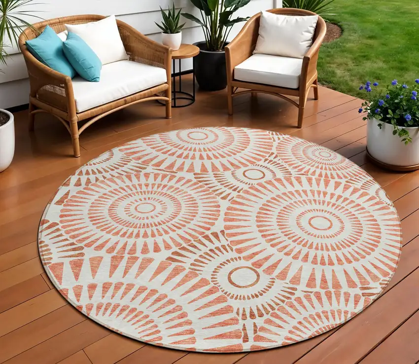 8' Coral And Ivory Round Geometric Washable Indoor Outdoor Area Rug Photo 1