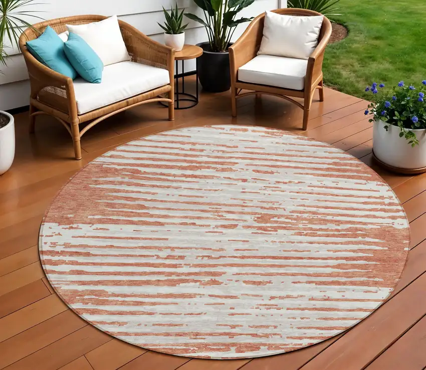 8' Coral And Ivory Round Striped Washable Indoor Outdoor Area Rug Photo 1