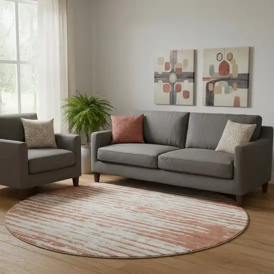 8' Coral And Ivory Striped Washable Round Rug With UV Protection Photo 1