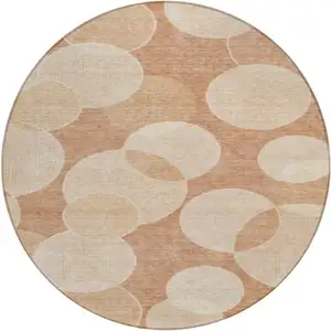 Photo of 8' Coral And Peach Round Geometric Washable Indoor Outdoor Area Rug