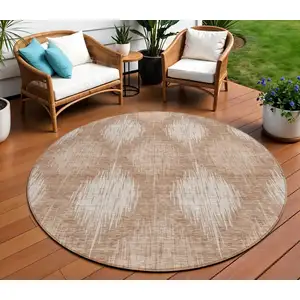 Photo of 8' Coral And Terra Cotta Round Ikat Washable Indoor Outdoor Area Rug