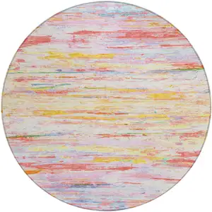 Photo of 8' Coral And Yellow Round Abstract Washable Indoor Outdoor Area Rug