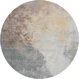 Photo of 8' Coral Beige And Ivory Abstract Washable Round Rug With UV Protection