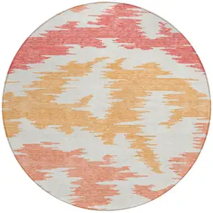 Photo of 8' Coral Beige And Orange Round Abstract Washable Indoor Outdoor Area Rug
