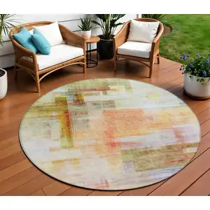 Photo of 8' Coral Blue And Green Round Abstract Washable Indoor Outdoor Area Rug