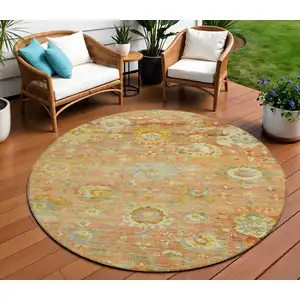 Photo of 8' Coral Blue And Green Round Floral Washable Indoor Outdoor Area Rug