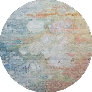 Photo of 8' Coral Blue And Ivory Abstract Washable Round Rug With UV Protection
