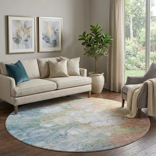 8' Coral Blue And Ivory Abstract Washable Round Rug With UV Protection Photo 1