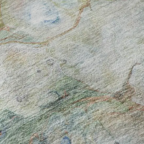 8' Coral Blue And Ivory Abstract Washable Round Rug With UV Protection Photo 9