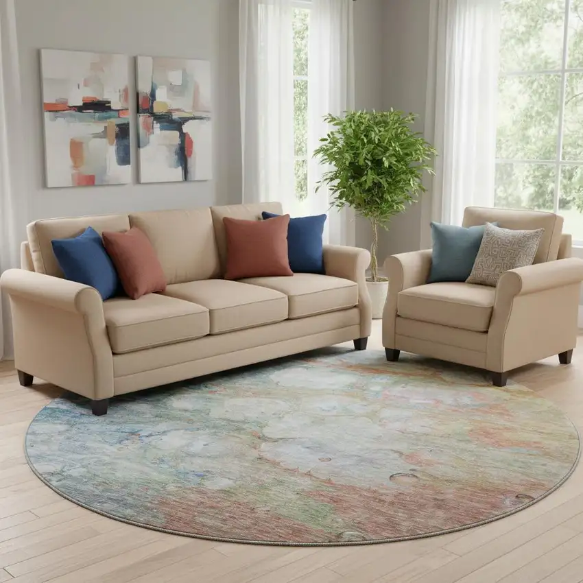 8' Coral Blue And Ivory Abstract Washable Round Rug With UV Protection Photo 1