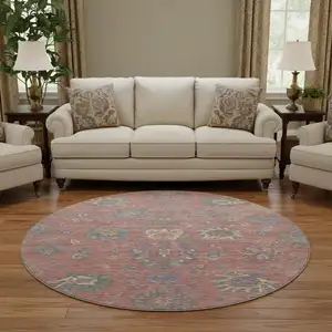 Photo of 8' Coral Blue And Ivory Oriental Washable Round Rug With UV Protection