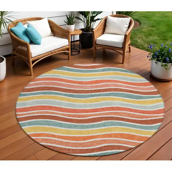 8' Coral Gold And Peach Round Striped Washable Indoor Outdoor Area Rug Photo 1