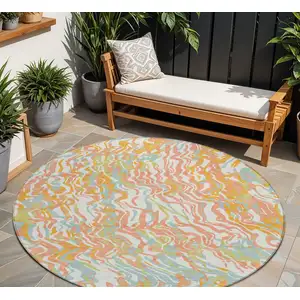 Photo of 8' Coral Green And Copper Round Abstract Washable Indoor Outdoor Area Rug