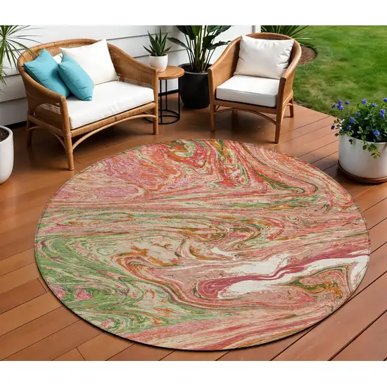 8' Coral Green And Ivory Round Abstract Washable Indoor Outdoor Area Rug Photo 1