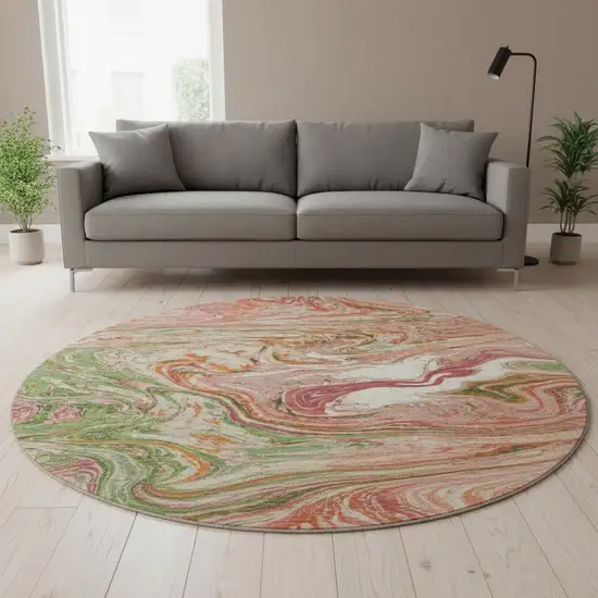 8' Coral Green And Peach Abstract Washable Round Rug With UV Protection Photo 2