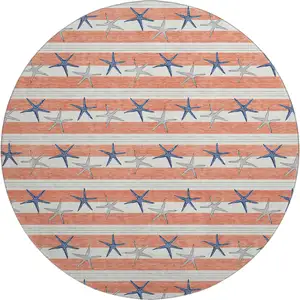 Photo of 8' Coral Ivory And Navy Blue Geometric Washable Round Rug With UV Protection