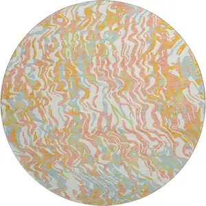 Photo of 8' Coral Mint Green And Sky Blue Abstract Washable Round Rug With UV Protection