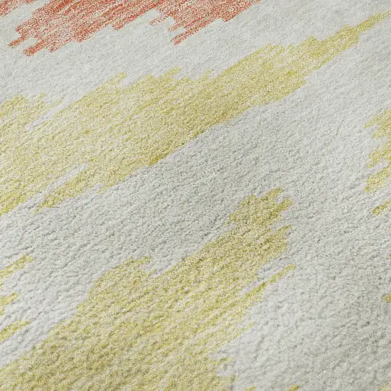 8' Coral Orange And Gold Abstract Washable Round Rug With UV Protection Photo 9