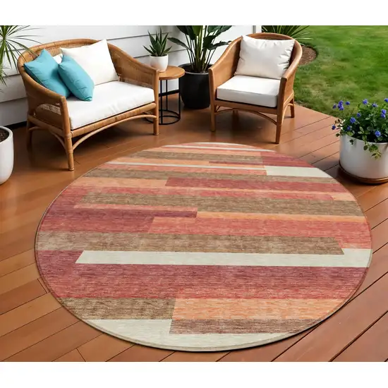 8' Coral Peach And Taupe Round Striped Washable Indoor Outdoor Area Rug Photo 1