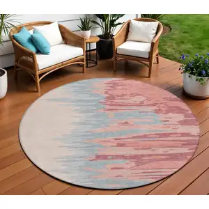 Photo of 8' Coral Pink And Gray Round Abstract Washable Indoor Outdoor Area Rug