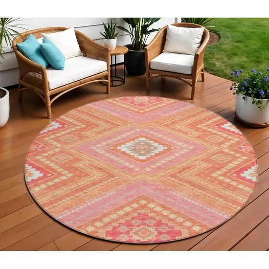 8' Coral Pink And Ivory Round Tribal Washable Indoor Outdoor Area Rug Photo 1