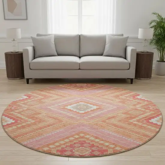 8' Coral Pink And Ivory Tribal Washable Round Rug With UV Protection Photo 2