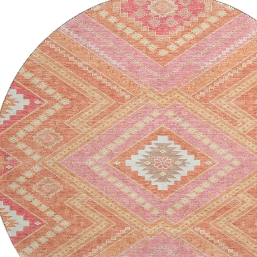 8' Coral Pink And Ivory Tribal Washable Round Rug With UV Protection Photo 2