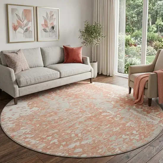 8' Coral Taupe And Ivory Abstract Washable Round Rug With UV Protection Photo 1