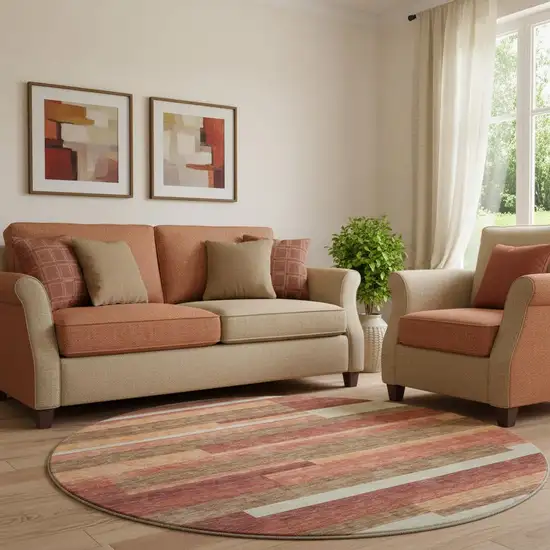 8' Coral Taupe And Orange Striped Washable Round Rug With UV Protection Photo 1