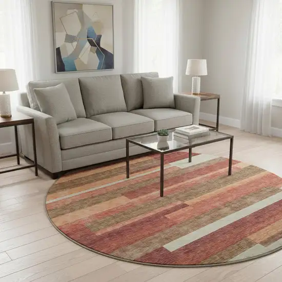 8' Coral Taupe And Orange Striped Washable Round Rug With UV Protection Photo 2