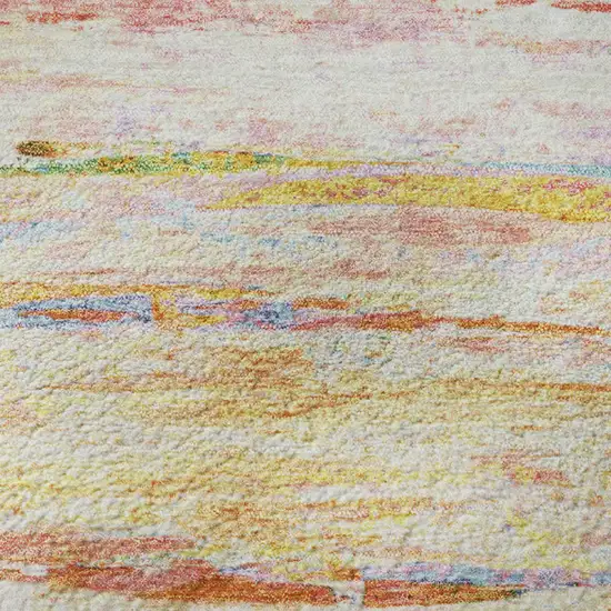 8' Coral Yellow And Ivory Abstract Washable Round Rug With UV Protection Photo 9
