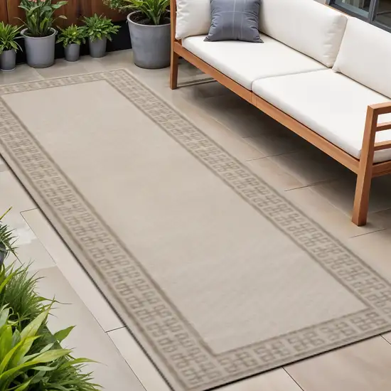 8' Cream And Beige Indoor Outdoor Runner Rug Photo 1