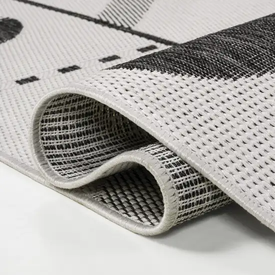8' Cream And Black Geometric Indoor Outdoor Runner Rug Photo 8