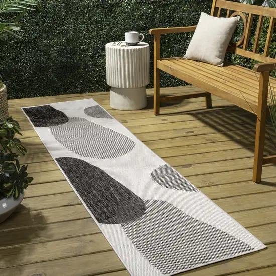 8' Cream And Black Geometric Indoor Outdoor Runner Rug Photo 4