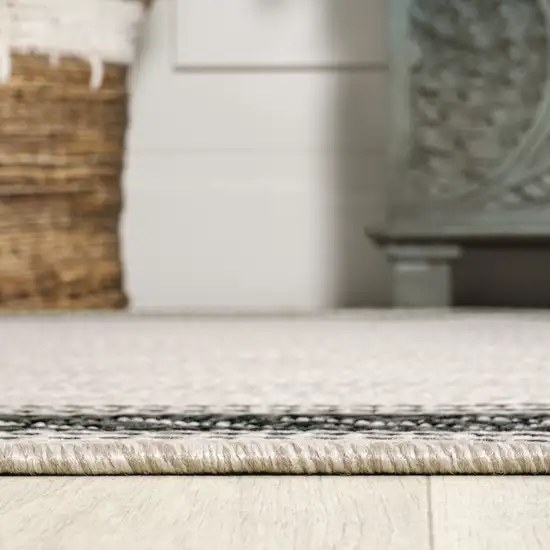 8' Cream And Black Indoor Outdoor Runner Rug Photo 7