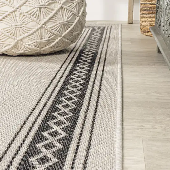 8' Cream And Black Indoor Outdoor Runner Rug Photo 4