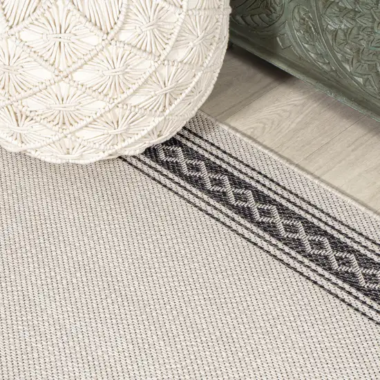 8' Cream And Black Indoor Outdoor Runner Rug Photo 8