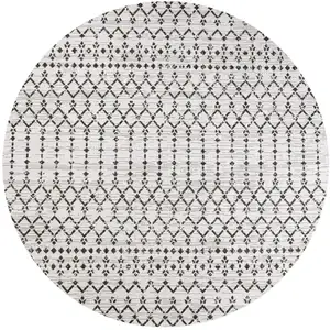 Photo of 6' Cream And Black Round Trellis Indoor Outdoor Area Rug