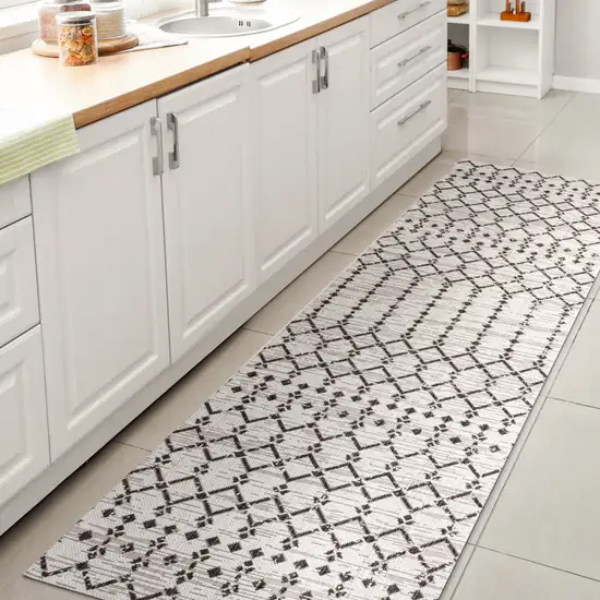 10' Cream And Black Trellis Indoor Outdoor Runner Rug Photo 6