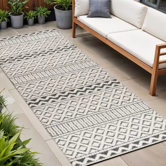 8' Cream And Black Trellis Indoor Outdoor Runner Rug Photo 1