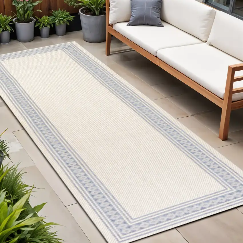 8' Cream And Blue Indoor Outdoor Runner Rug Photo 1