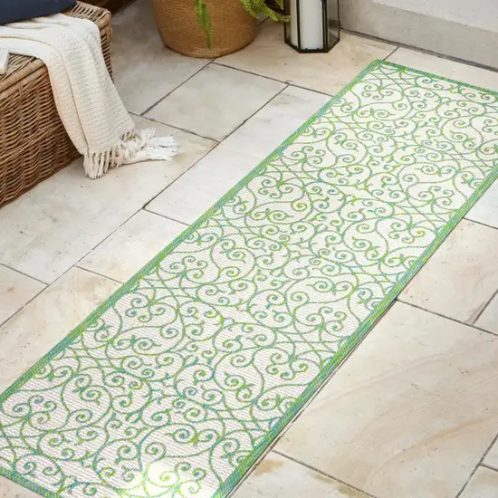 10' Cream And Green Geometric Indoor Outdoor Runner Rug Photo 5