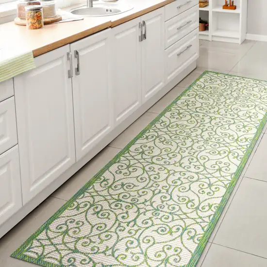 10' Cream And Green Geometric Indoor Outdoor Runner Rug Photo 6