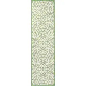 Photo of 10' Cream And Green Geometric Indoor Outdoor Runner Rug
